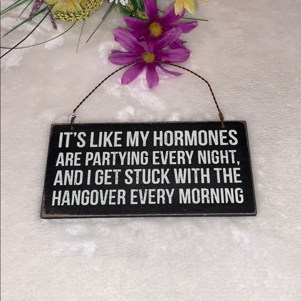 Wooden quoted plaque.